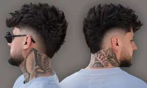 Man med en modern mullet frisyr, blekt nacke och tatueringar på halsen.