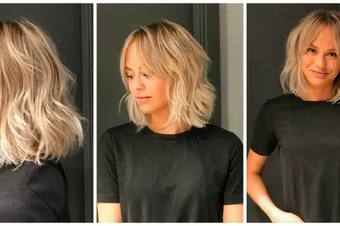 En kvinna med blont, tunt hår och gardinlugg. Håret är stylat i en avslappnad lob med mjuka vågor.